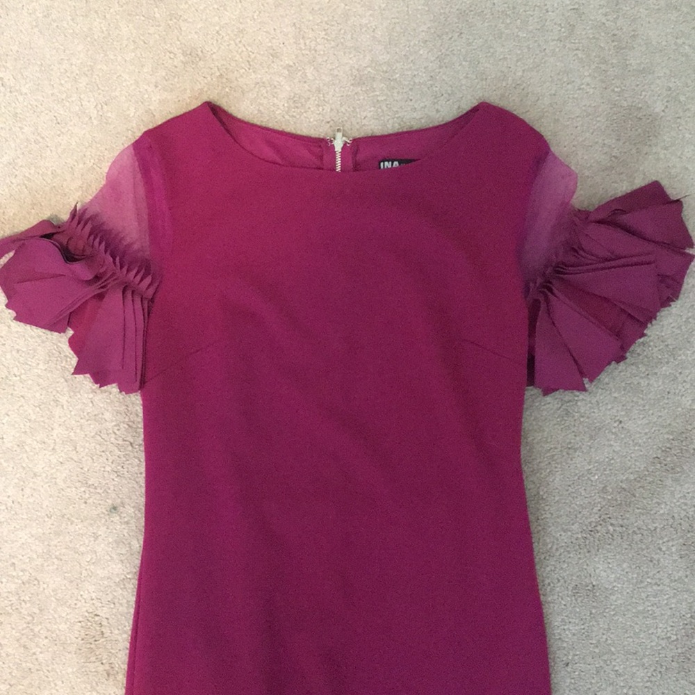 Tight dress with frilled sleeves